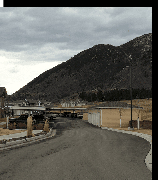 Mountain view with residential street and houses.